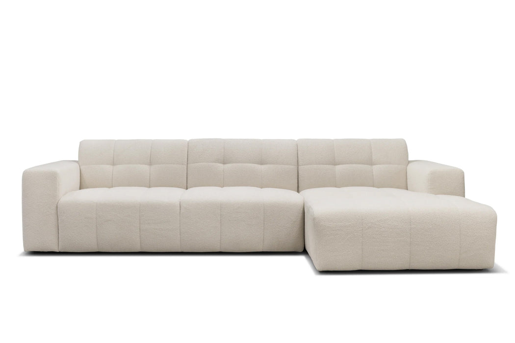 Canapé d’angle Napoli beige clair dans un salon moderne au design scandinave